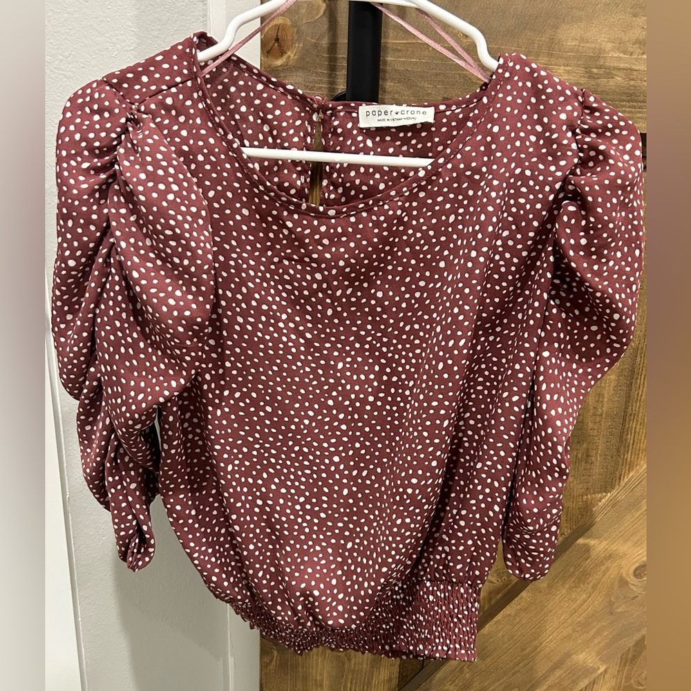 Dress top with ruffle sleeves.